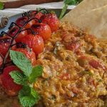 طرز تهیه میرزا قاسمی با بادمجان کبابی و طعم دودی